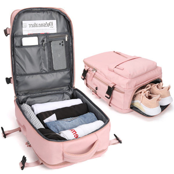 Sac à dos ergonomique de voyage rose avec multiples rangements chaussures et vêtements et autres poches.