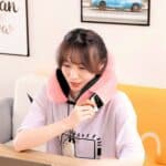 Oreiller de voyage rose en U pour cervicales